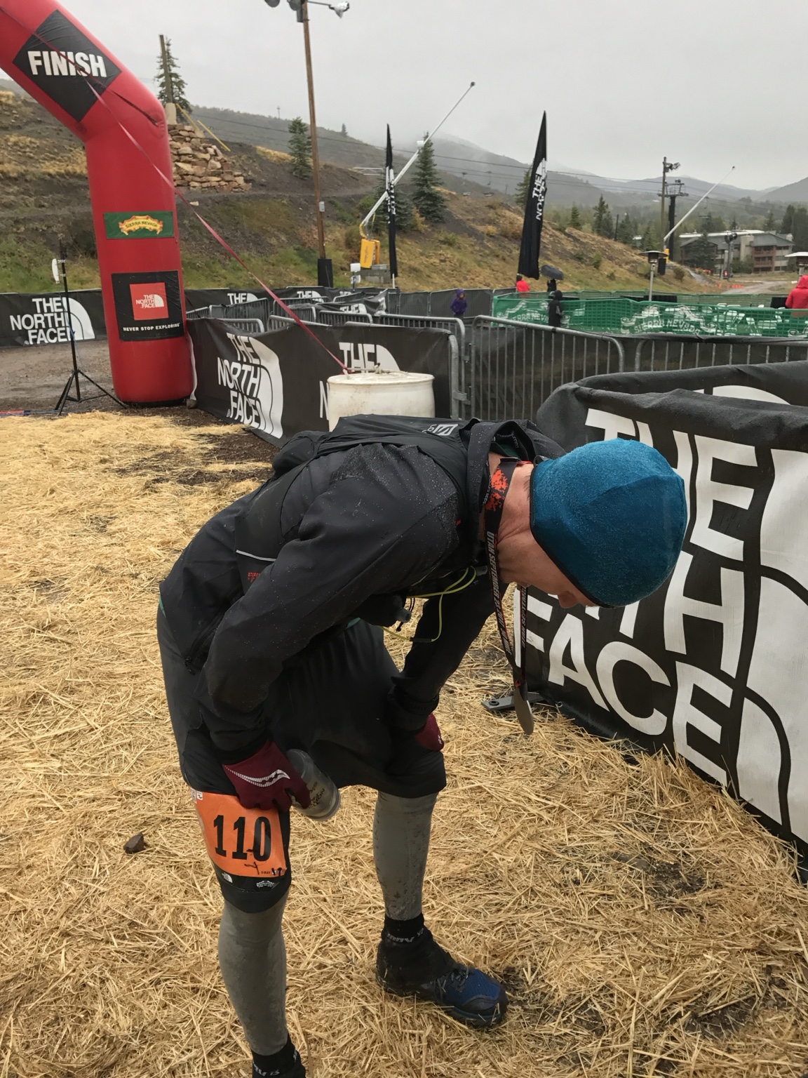 Coach catching his breath after an ultramarathon finish